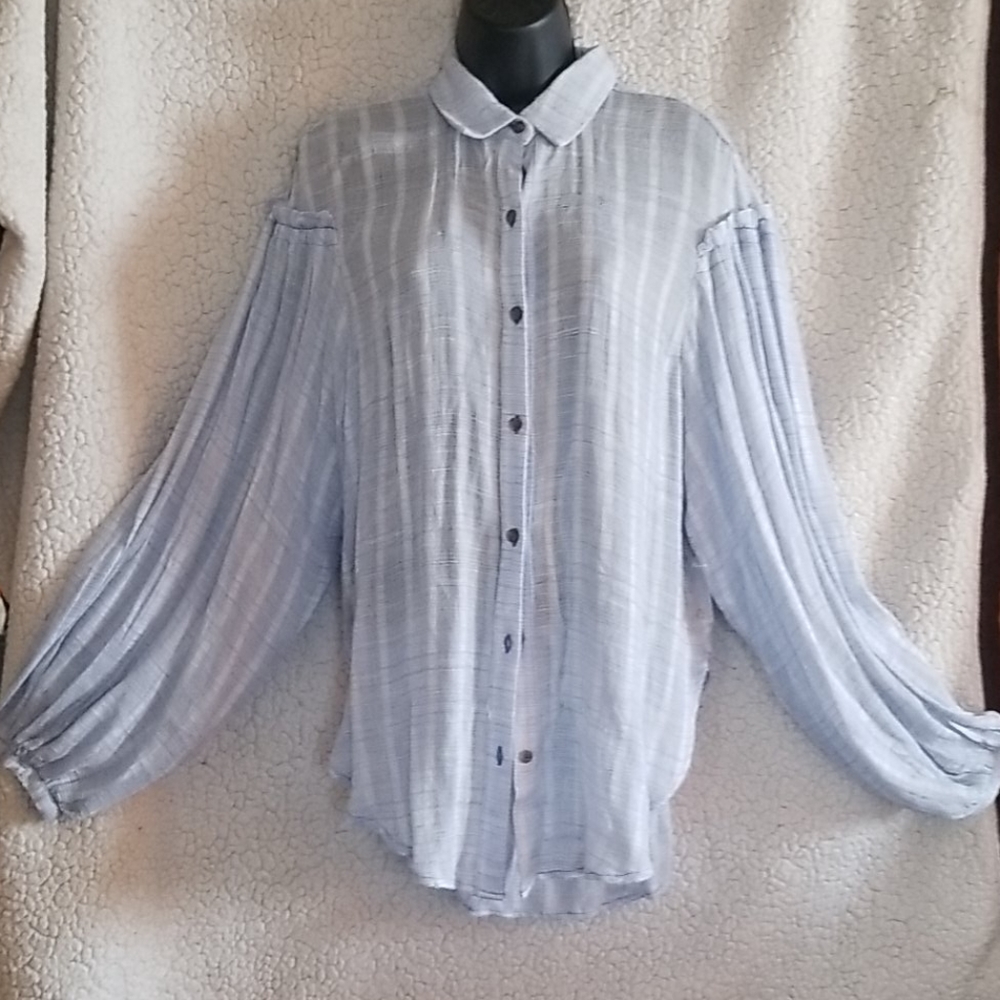 Free People Baby Blue Puff Sleeve shirt.